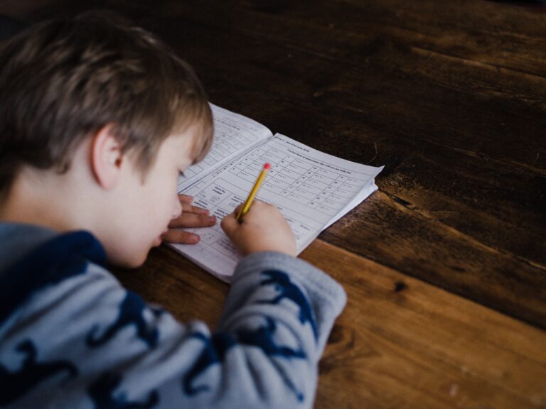 Child studying on desk